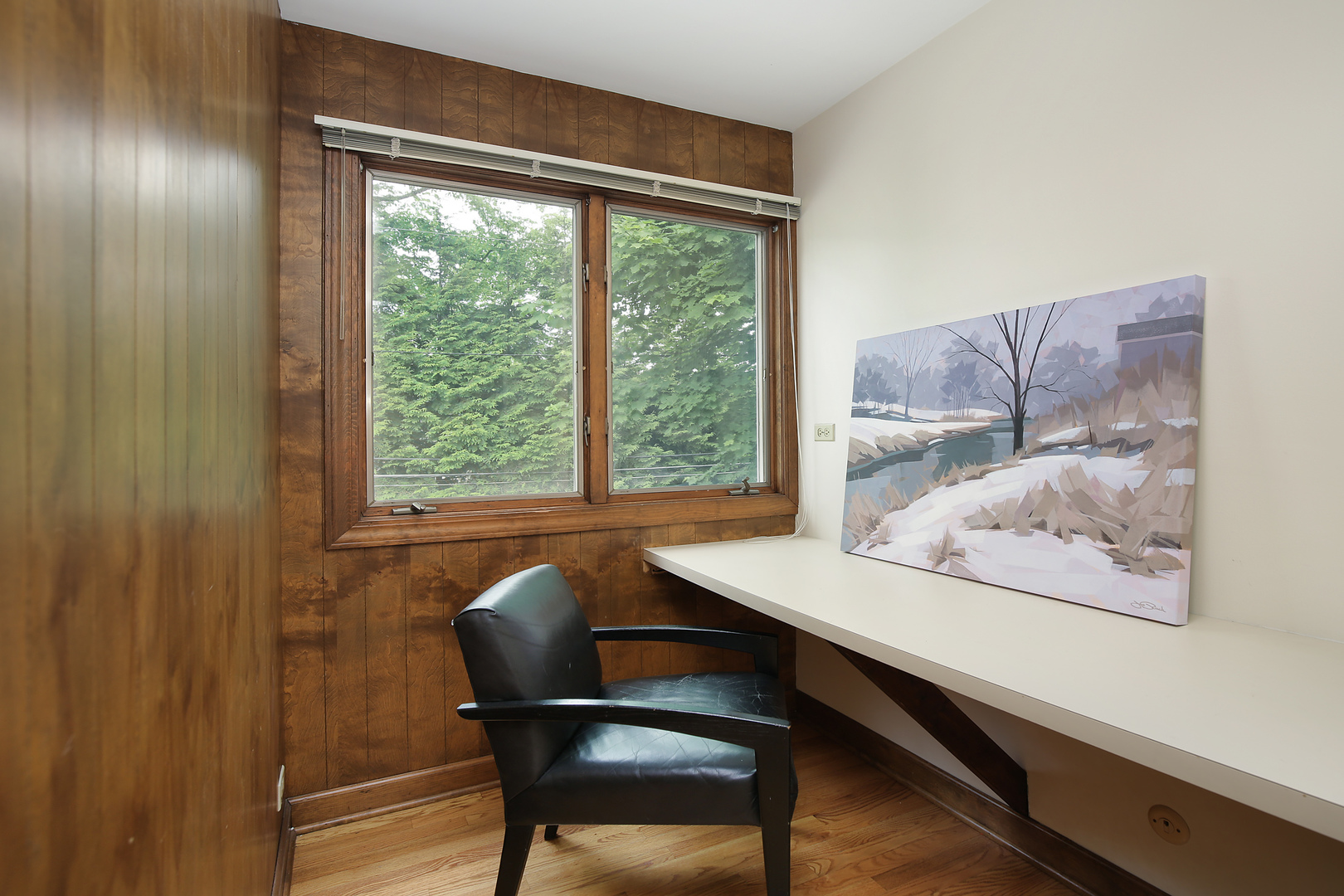2653 Sheridan Road Evanston, IL 60201 - Photo 15 of 17 a view of a workspace with furniture and a window