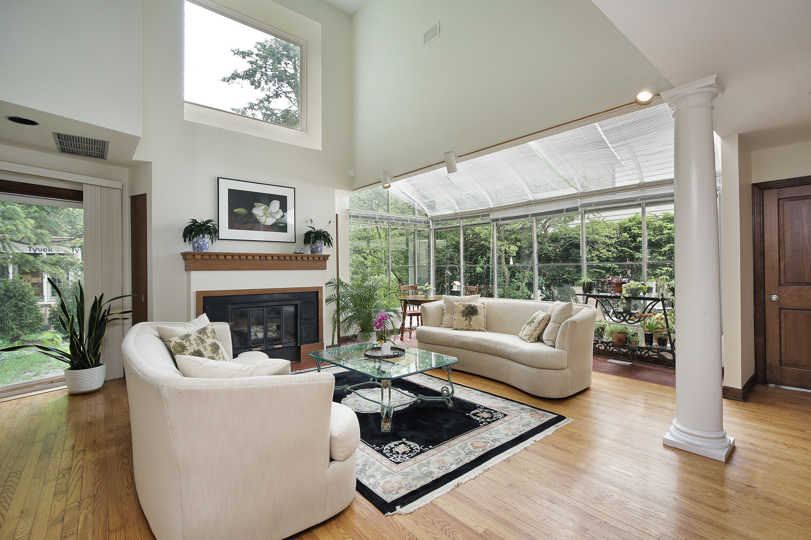 2653 Sheridan Road Evanston, IL 60201 - Photo 3 of 17 a living room with furniture a fireplace and a large window
