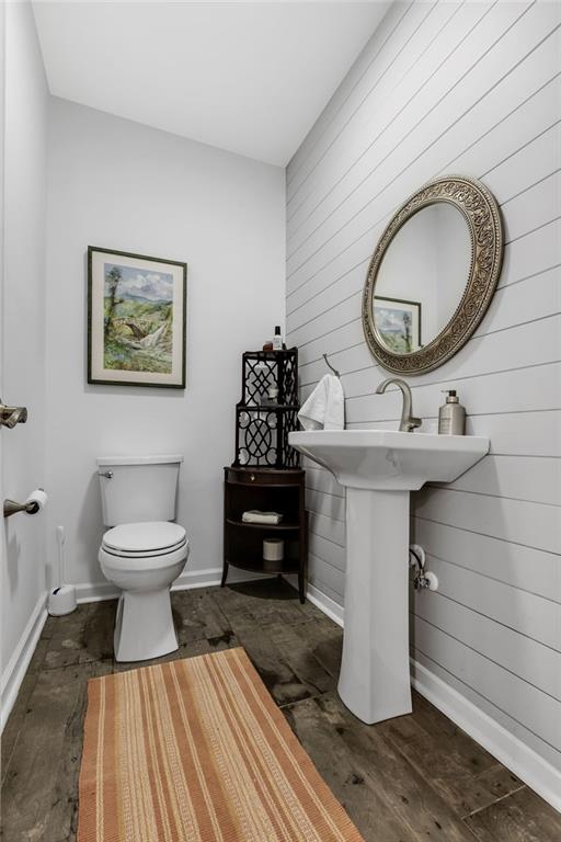12 Providence Way Milton, GA 30004 - Photo 23 of 56 a bathroom with a toilet a sink and a mirror