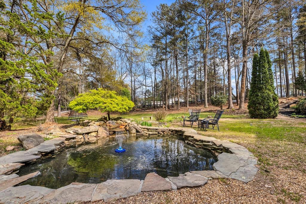 12 Providence Way Milton, GA 30004 - Photo 52 of 56 a view of a yard with swimming pool