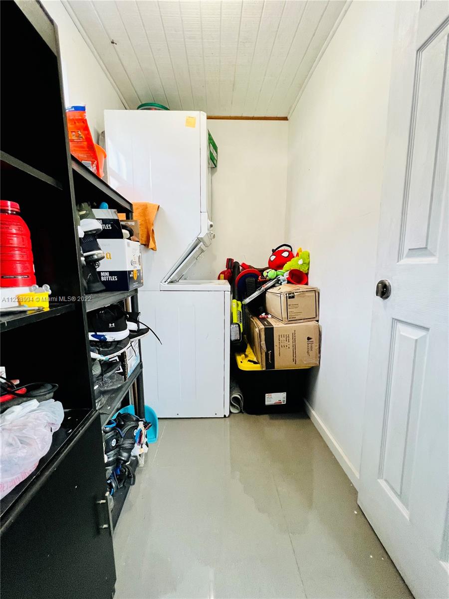 599 West 46th Place Hialeah, FL 33012 - Photo 22 of 25 a children room with toys and white walls