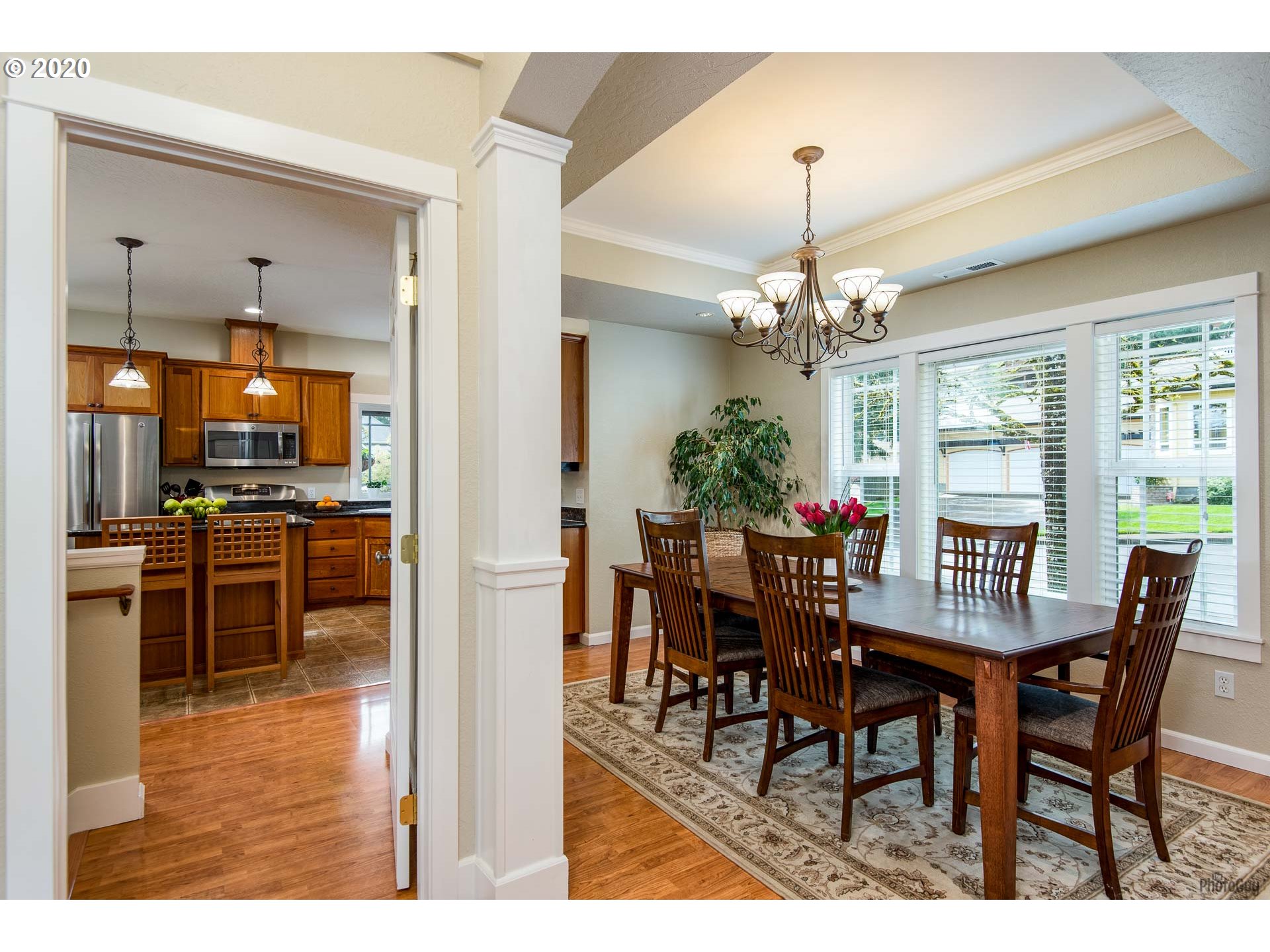 845 South 67th Street Springfield, OR 97478 - Photo 8 of 32 a view of a dining room with furniture window and wooden floor