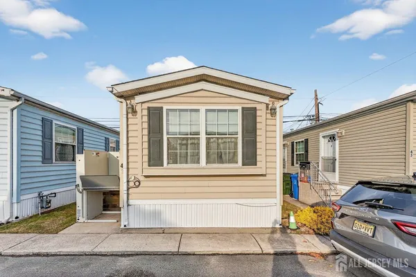 a front view of a house with a garage