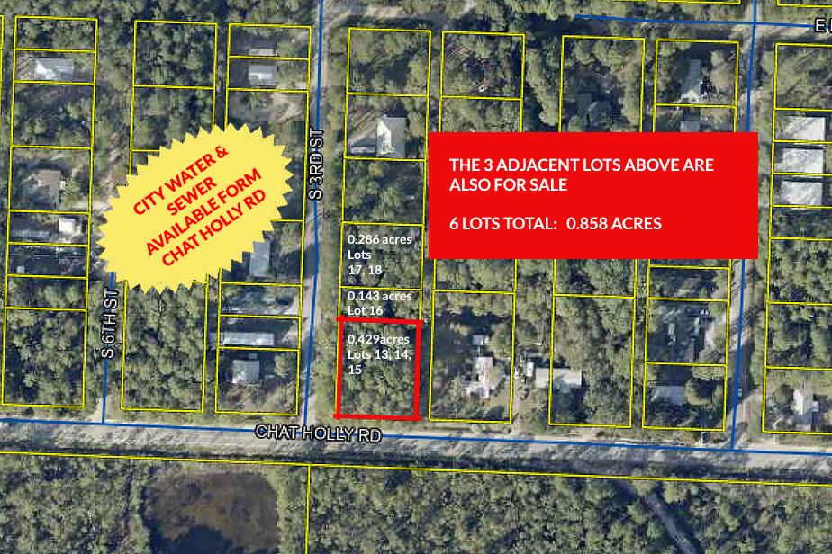 Lots13-15 Chat Holley Road Santa Rosa Beach, FL 32459 - Photo 2 of 8 a sign that is on the side of a road