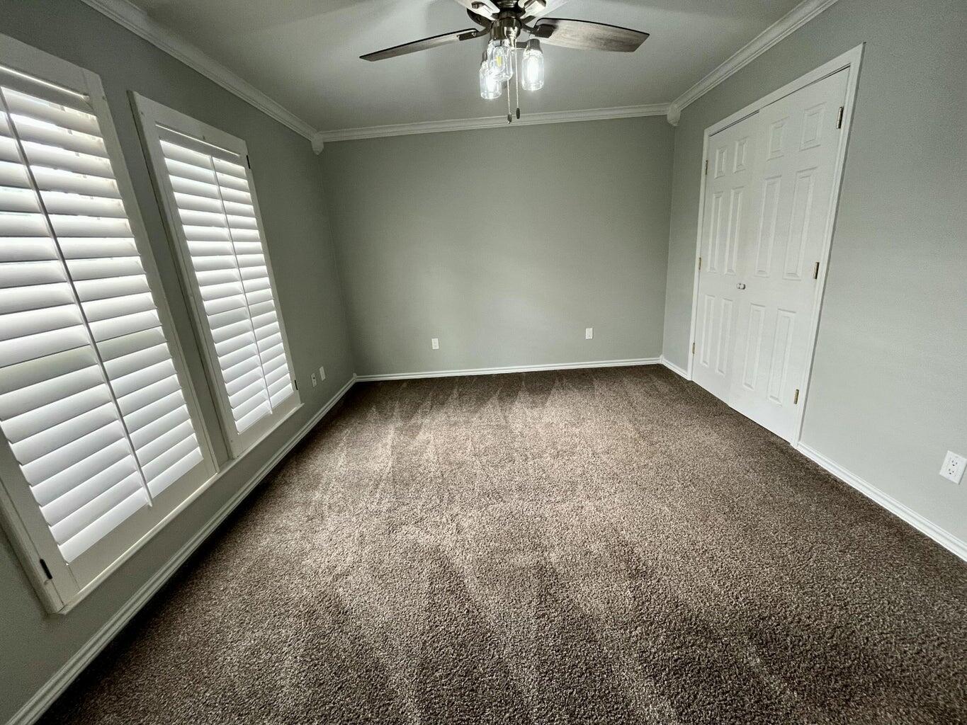 1415 Ebeling Drive Plainview, TX 79072 - Photo 23 of 46 a view of an empty room with a window