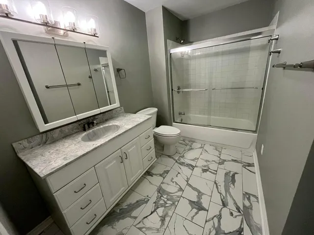 a view of room with washer and dryer