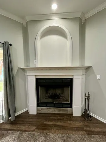 a living room with a fireplace