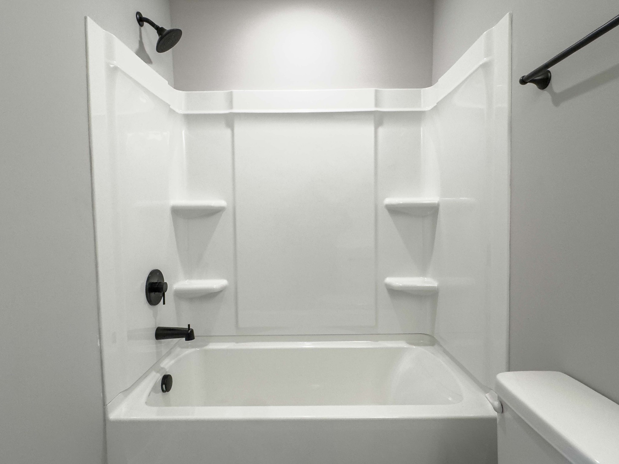 404 Jonathan Wade Circle Clarksville, TN 37043 - Photo 18 of 25 a bathroom with a bathtub and a toilet