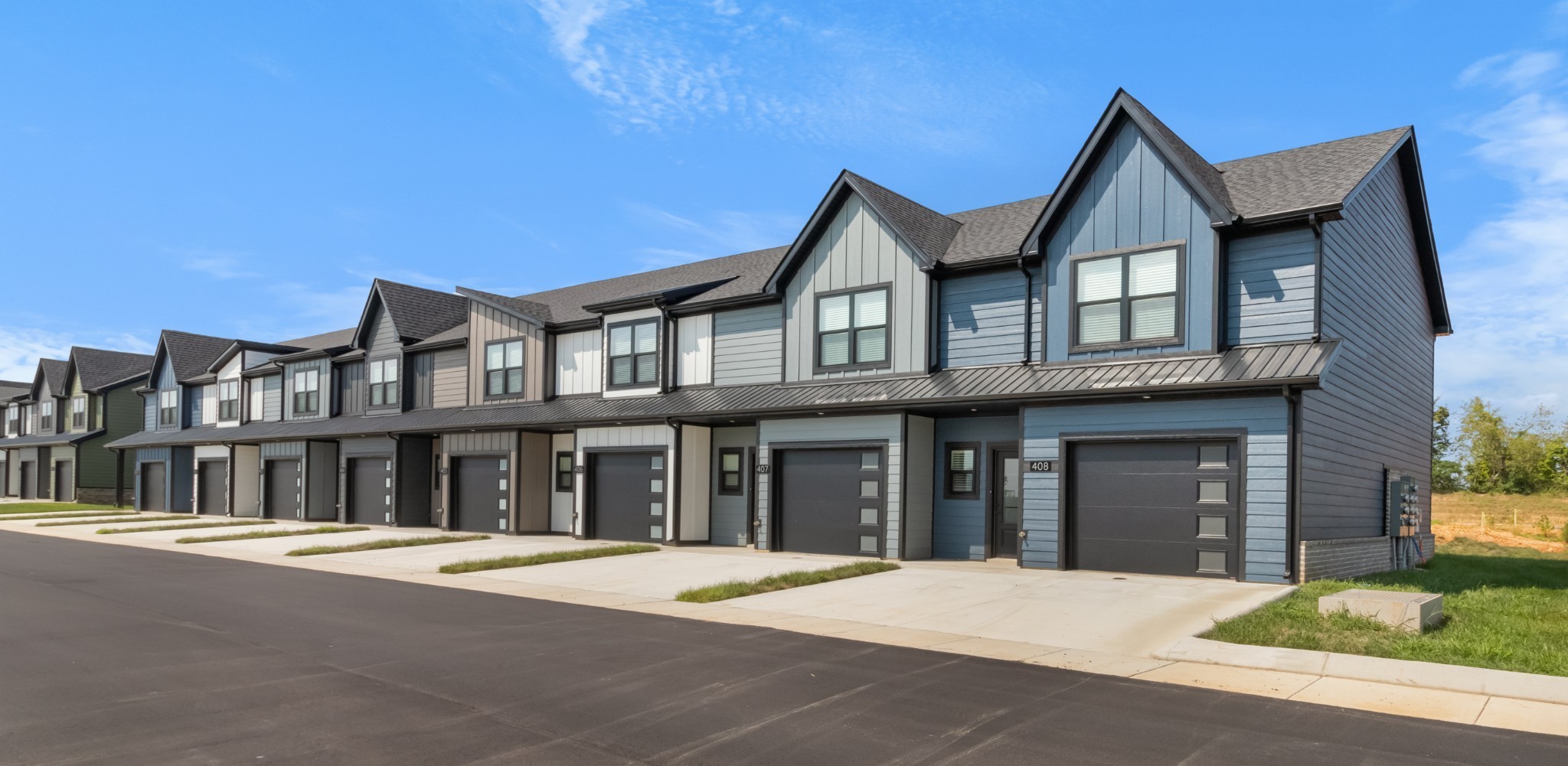 404 Jonathan Wade Circle Clarksville, TN 37043 - Photo 2 of 25 a front view of a house with a yard