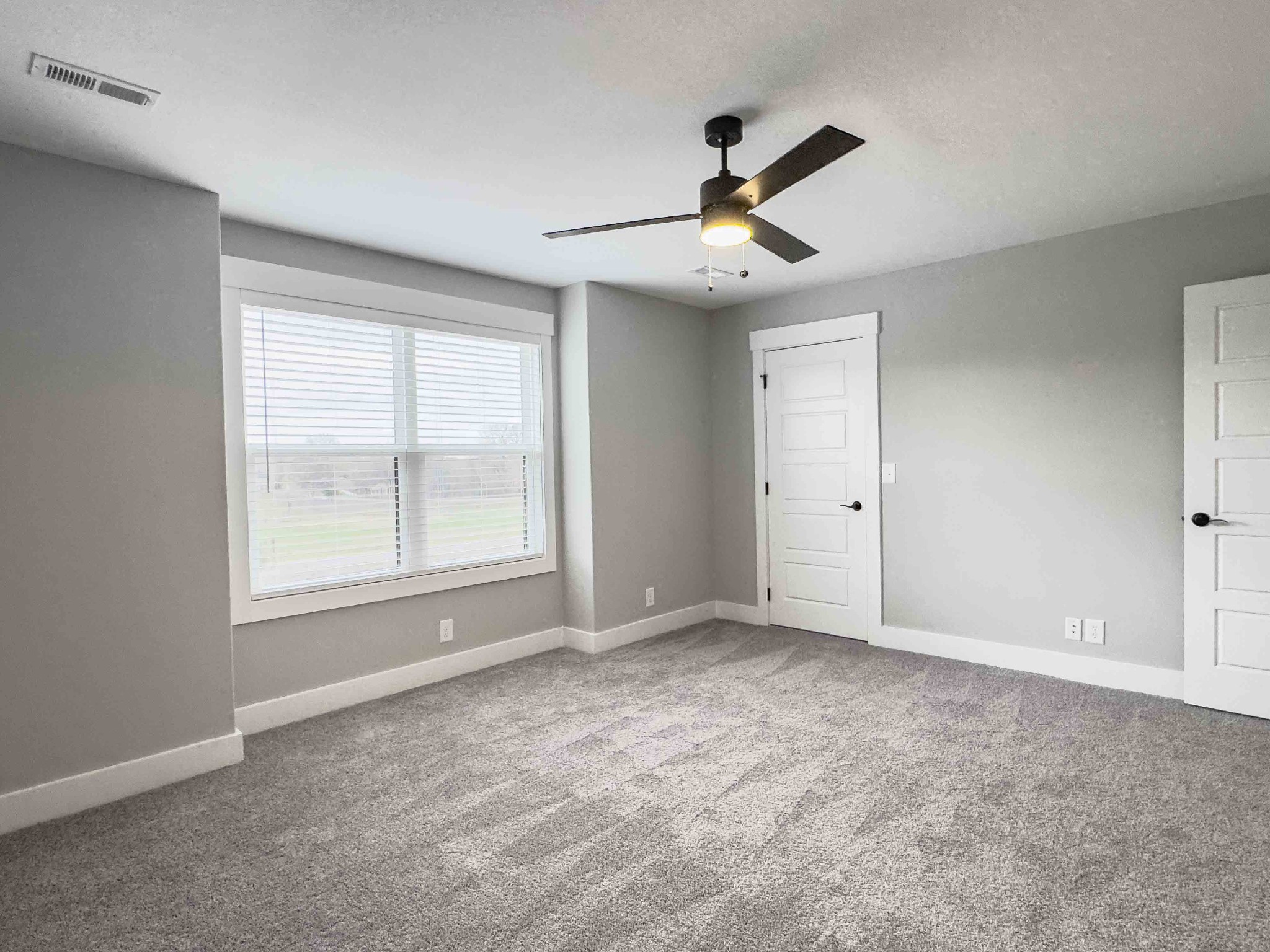 404 Jonathan Wade Circle Clarksville, TN 37043 - Photo 22 of 25 a view of an empty room with a window