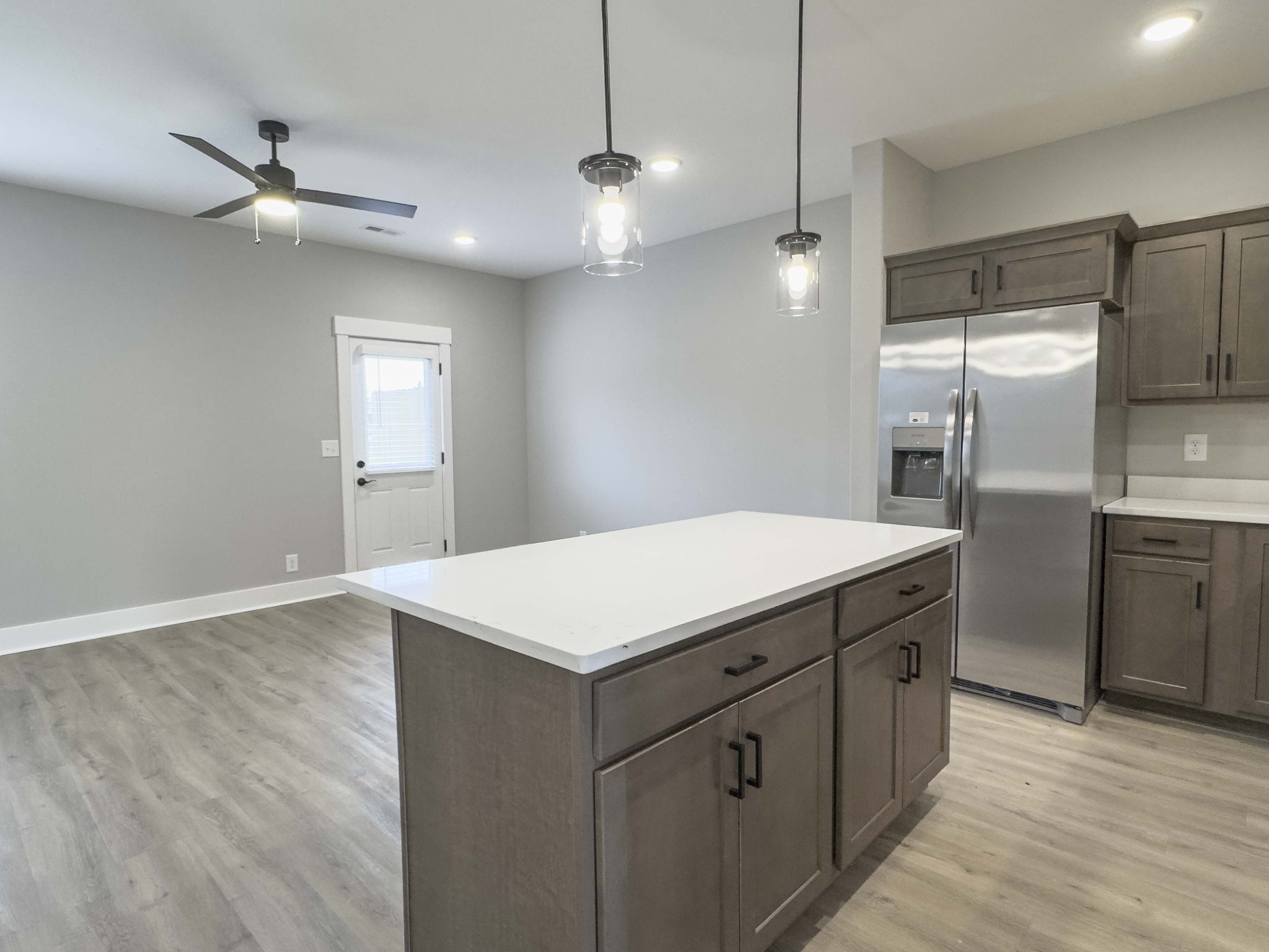404 Jonathan Wade Circle Clarksville, TN 37043 - Photo 5 of 25 a kitchen with a refrigerator a sink and dishwasher
