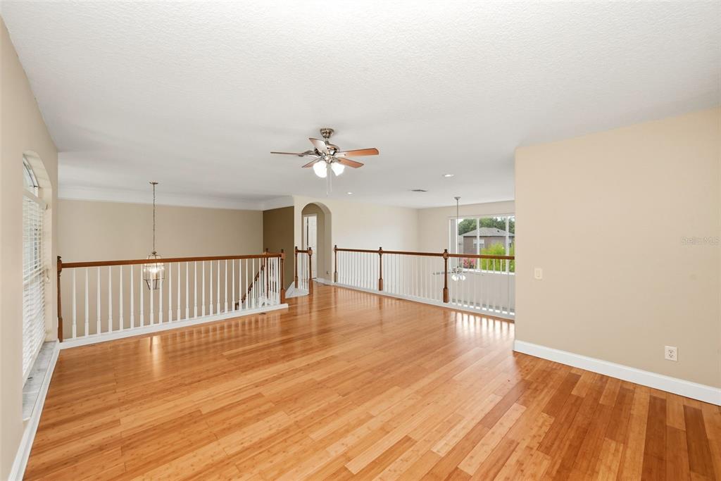 936 Kingsridge Circle Gotha, FL 34734 - Photo 21 of 50 a view of a hallway with wooden floor