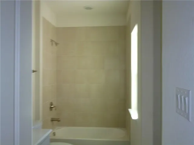 a bathroom with a bathtub