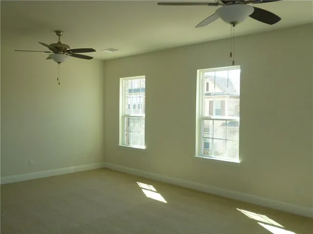 an empty room with windows