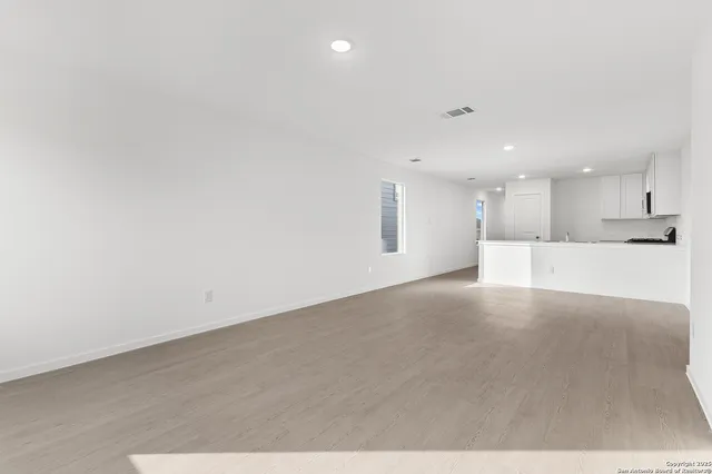 a view of kitchen with wooden floor