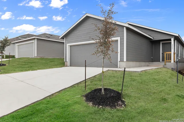 a house view with a garden space