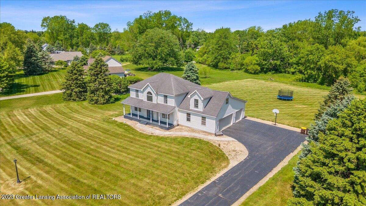 65 Three Oaks Road Okemos, MI 48864 - Photo 1 of 61 06-Media Jett-5