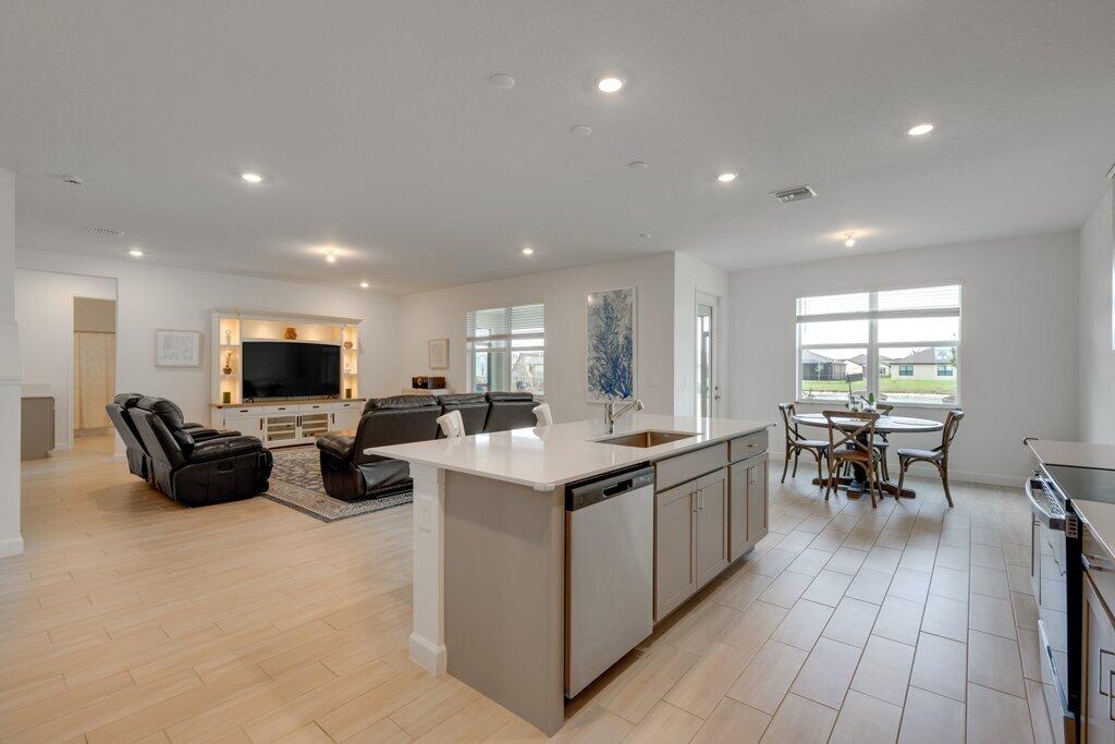 12328 Southwest Roma Circle Port St. Lucie, FL 34987 - Photo 17 of 72 Kitchen to Patio.jpg-SMALL