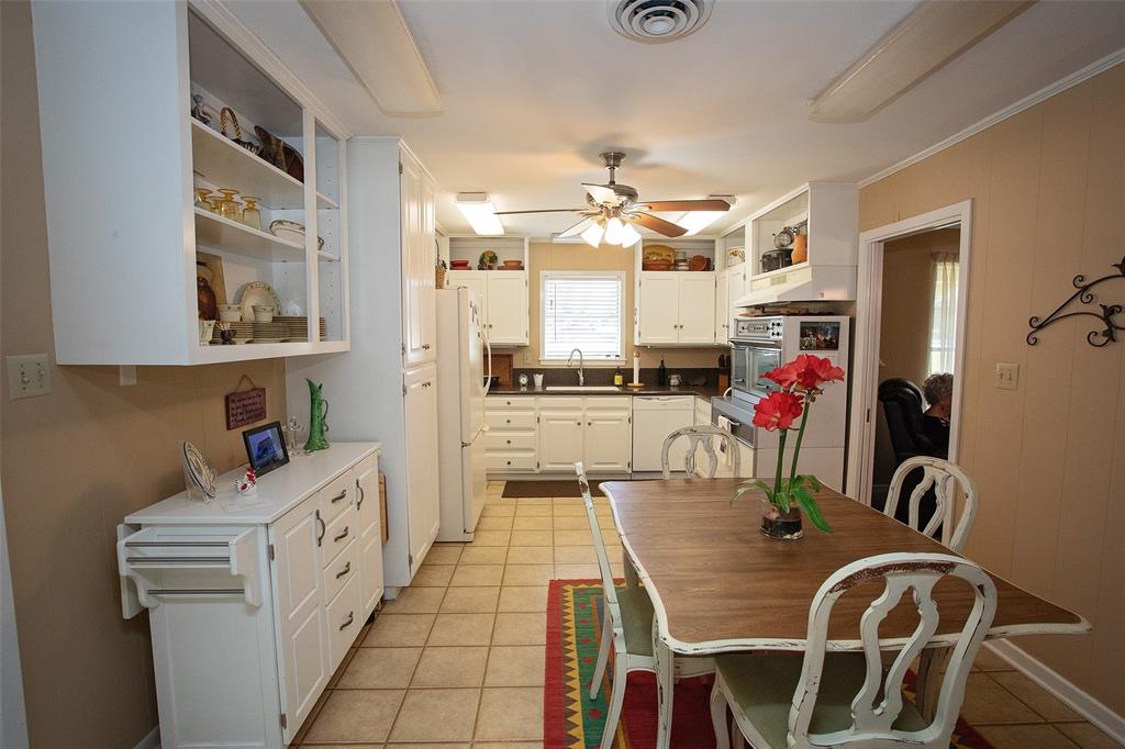 914 Fairview Street Graham, TX 76450 - Photo 3 of 17 a very nice looking dining room with a dining table and chairs