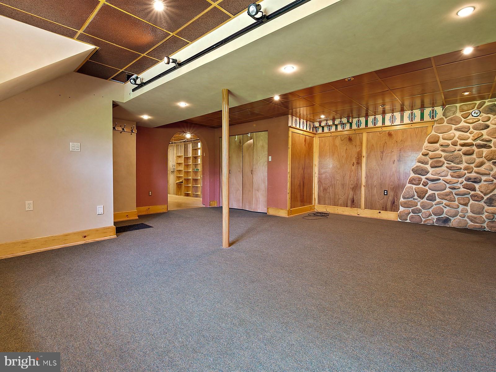 10 Wesley Road Quarryville, PA 17566 - Photo 17 of 25 a view of an empty room with a chandelier