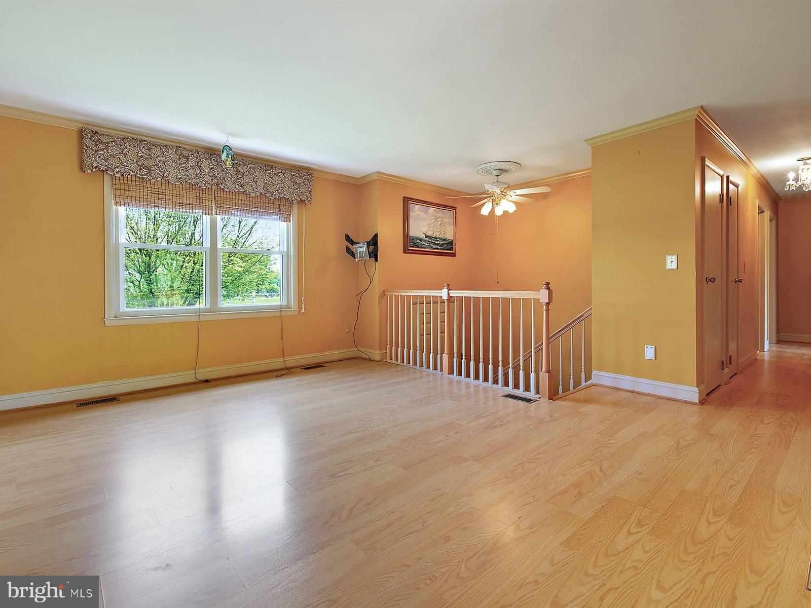 10 Wesley Road Quarryville, PA 17566 - Photo 3 of 25 a view of a livingroom with wooden floor and a window