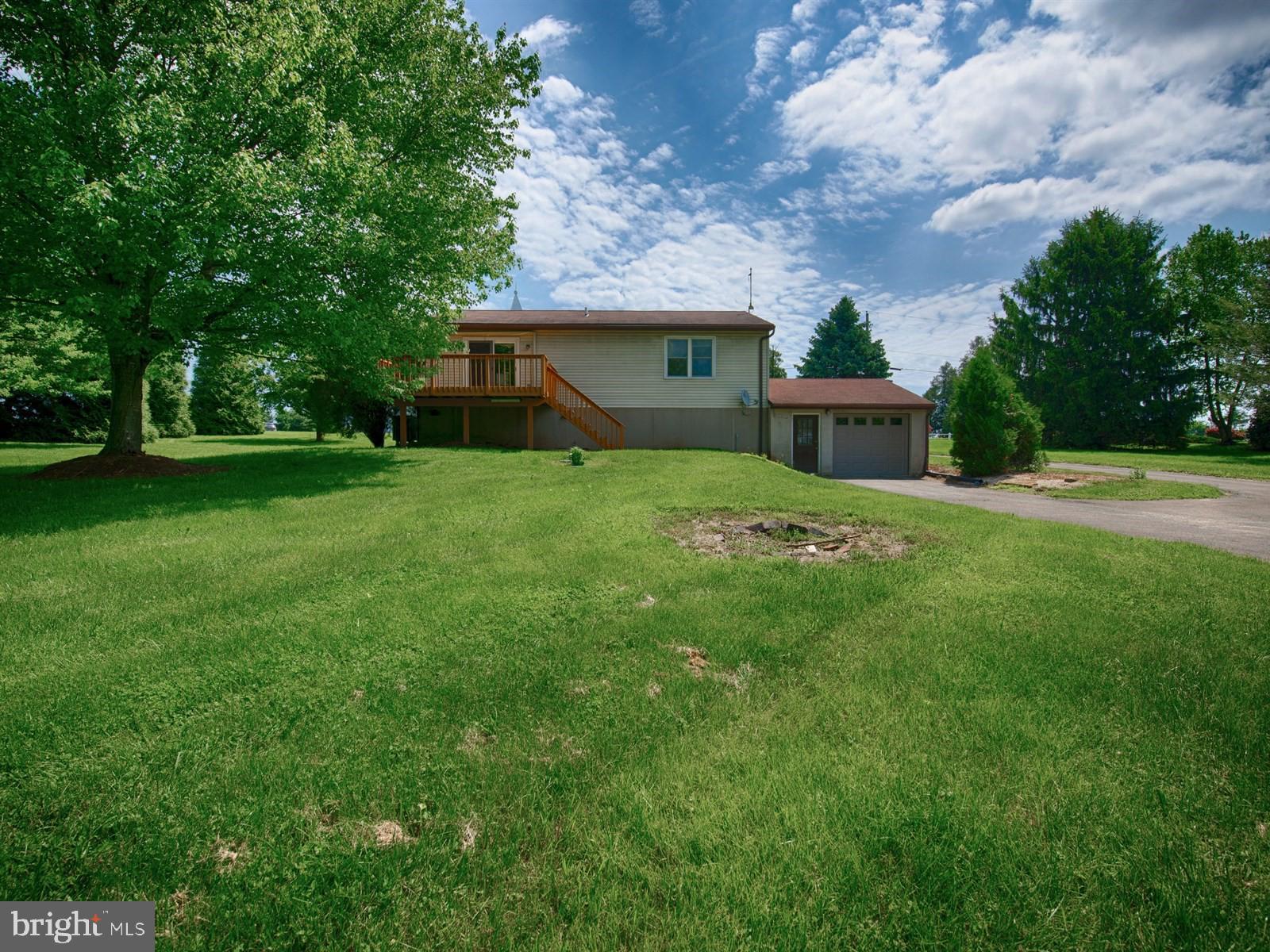 10 Wesley Road Quarryville, PA 17566 - Photo 22 of 25 a view of a backyard with a garden