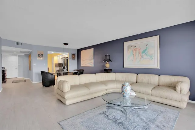 a living room with furniture and a couch