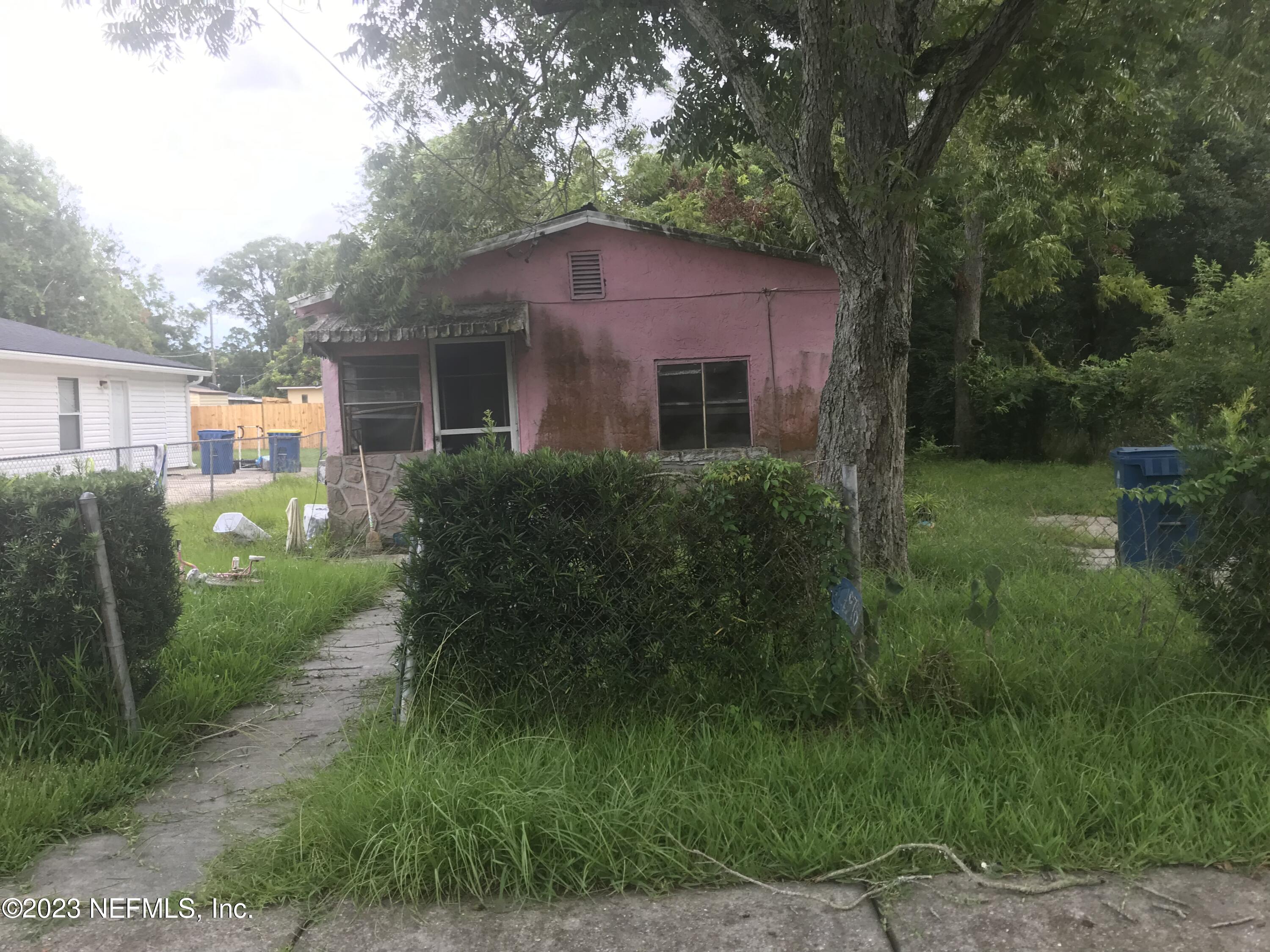 a house view with a garden space