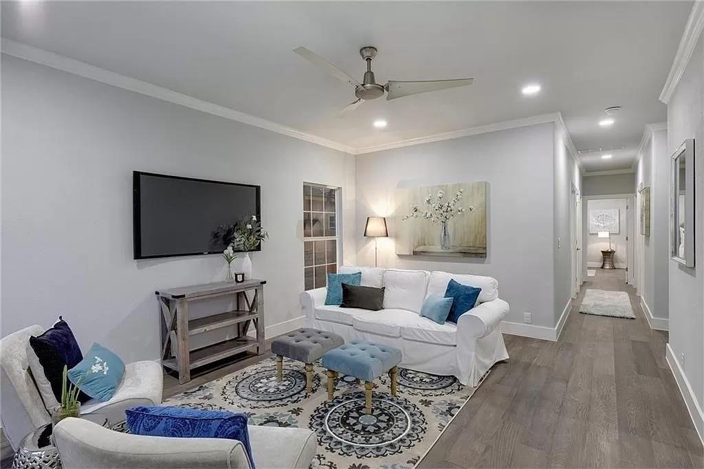 1217 Eleanor Street Austin, TX 78721 - Photo 3 of 17 Living room with ceiling fan, crown molding, wood finished floors, and recessed lighting