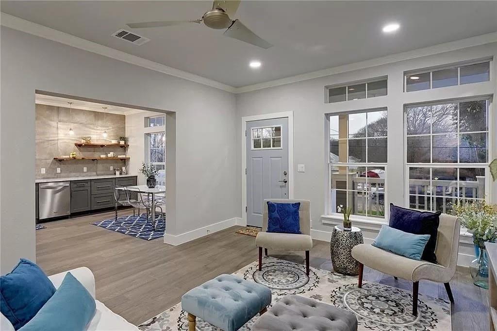 1217 Eleanor Street Austin, TX 78721 - Photo 4 of 17 Sitting room featuring ornamental molding, light wood-style flooring, ceiling fan, plenty of natural light, and recessed lighting