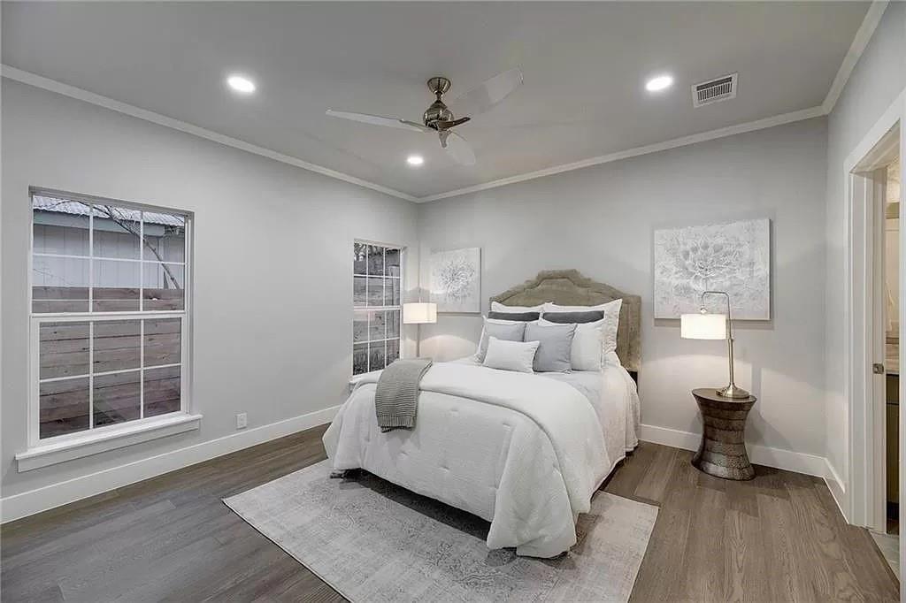 1217 Eleanor Street Austin, TX 78721 - Photo 9 of 17 Bedroom with crown molding, a ceiling fan, wood finished floors, and recessed lighting