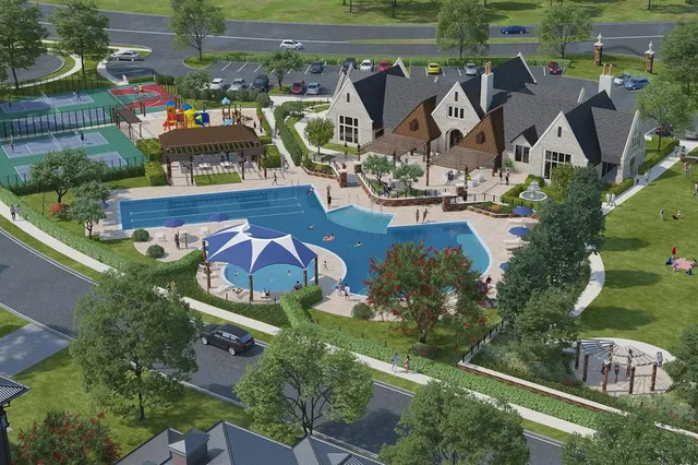 an aerial view of a house with a garden