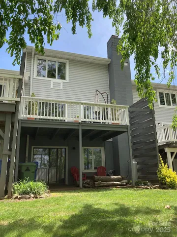 a backyard of a house with seating space