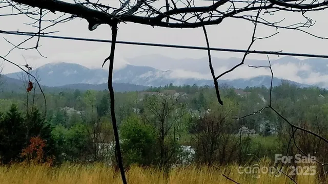 a view of car parked on the side of the road