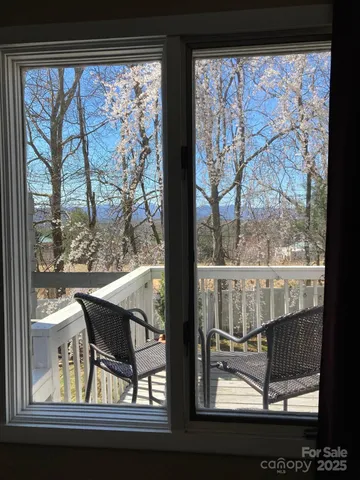 a view of a lake from a window