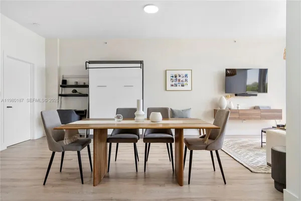 a view of a dining room with furniture