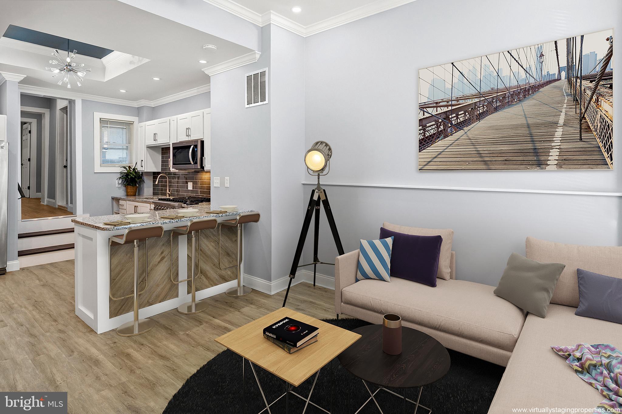 2112 Eastern Avenue Baltimore, MD 21231 - Photo 2 of 43 a living room with furniture