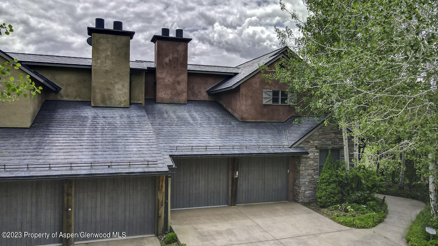 764 Promontory Lane Basalt, CO 81621 - Photo 1 of 43 front view of a house with plants