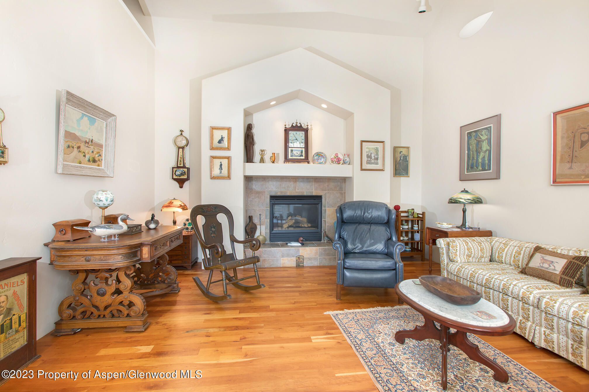 764 Promontory Lane Basalt, CO 81621 - Photo 12 of 43 a living room with furniture a fireplace and a table
