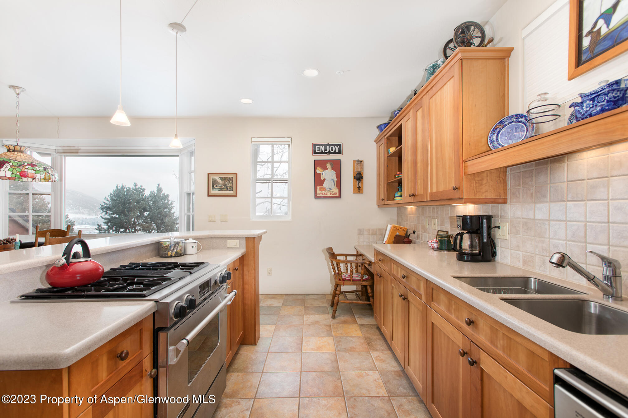 764 Promontory Lane Basalt, CO 81621 - Photo 20 of 43 a kitchen that has a sink and a stove