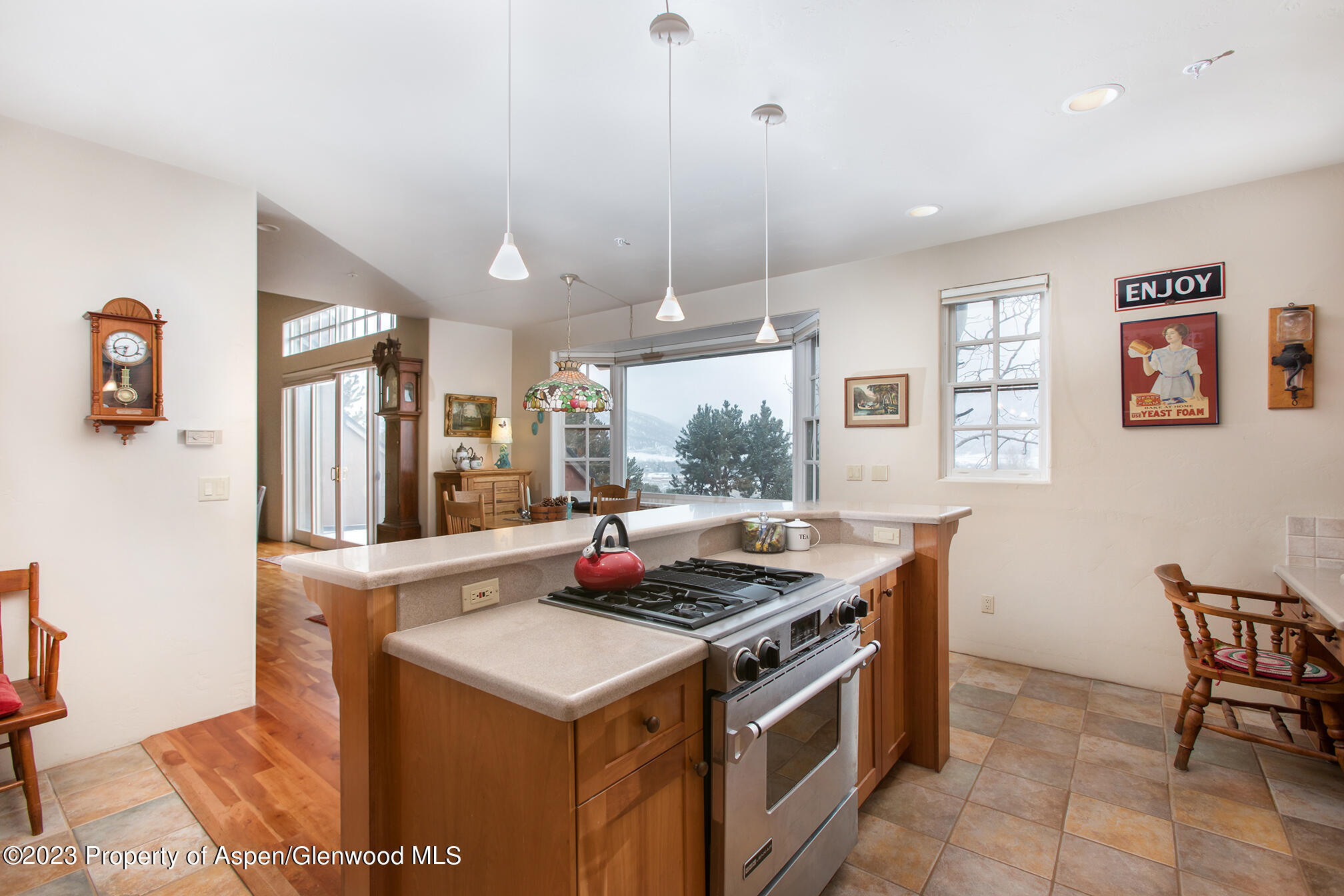 764 Promontory Lane Basalt, CO 81621 - Photo 21 of 43 a kitchen that has a stove and a table in it