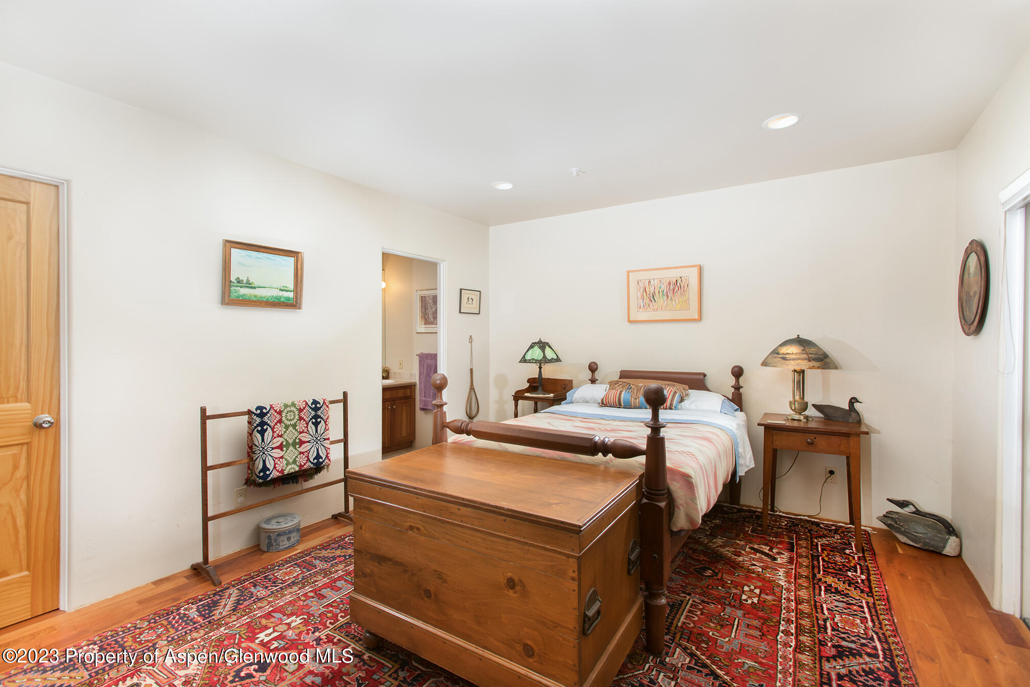 764 Promontory Lane Basalt, CO 81621 - Photo 28 of 43 a bed room with a bed and furniture