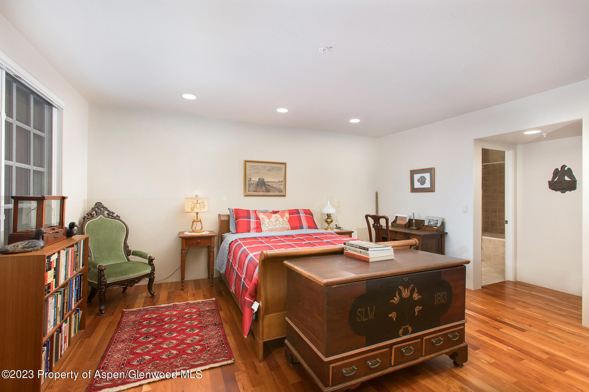 764 Promontory Lane Basalt, CO 81621 - Photo 29 of 43 a bed room with a bed and dresser