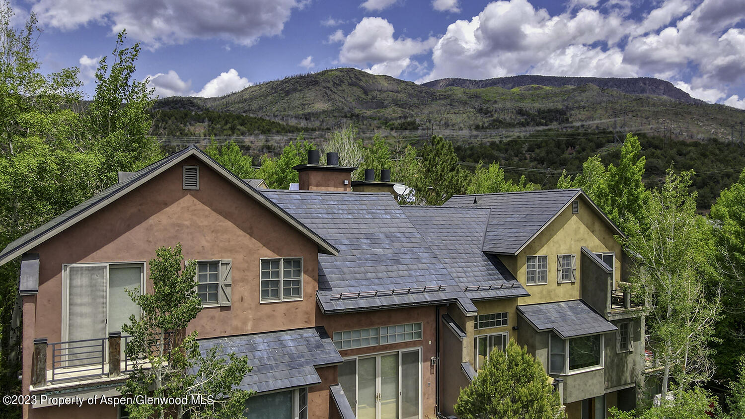 764 Promontory Lane Basalt, CO 81621 - Photo 3 of 43 a aerial view of a house next to a yard
