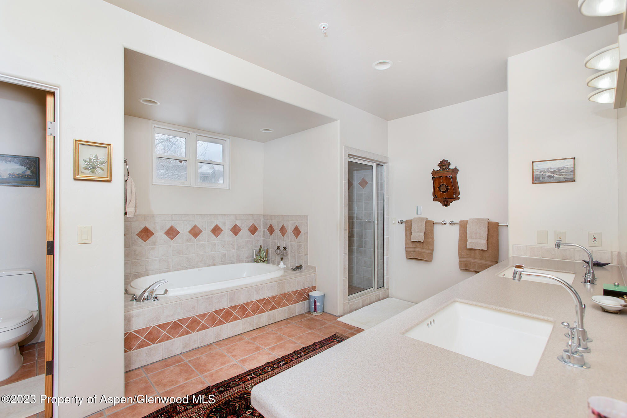 764 Promontory Lane Basalt, CO 81621 - Photo 34 of 43 a bedroom with a bed and a window