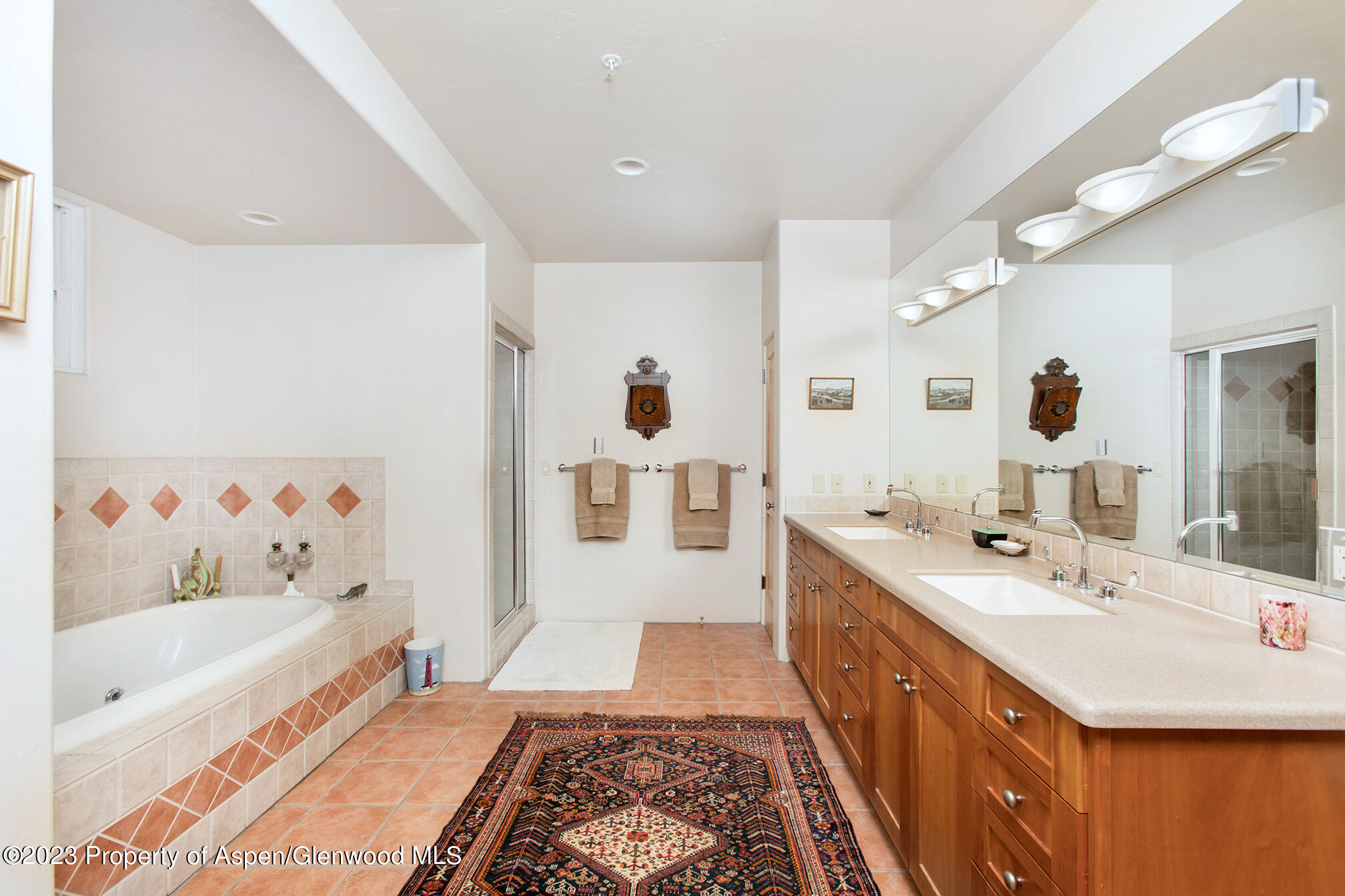 764 Promontory Lane Basalt, CO 81621 - Photo 35 of 43 a spacious bathroom with a tub sink and mirror