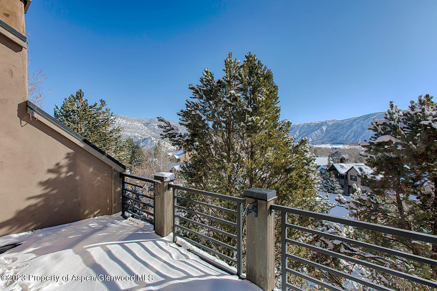 764 Promontory Lane Basalt, CO 81621 - Photo 9 of 43 a view of balcony with wooden floor and city view