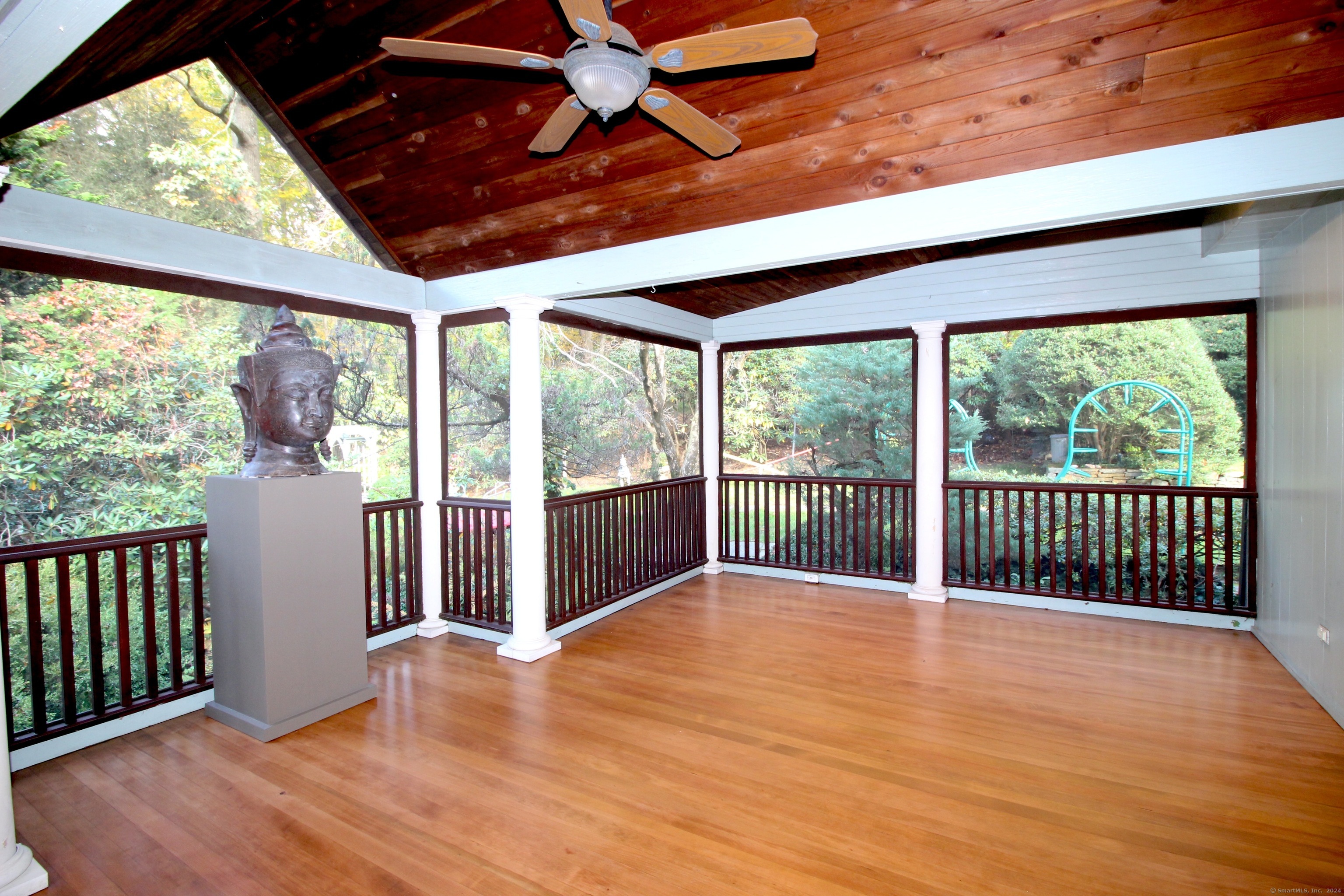 8 Bayberry Ridge Road Westport, CT 06880 - Photo 10 of 40 Screen Porch off Kitchen features wood floor and a view of the rear Garden.