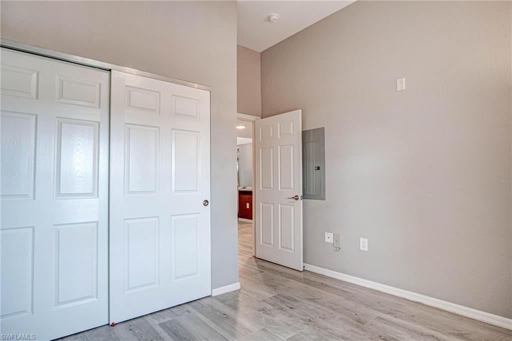 4450 Botanical Pl Circle, Unit 406 Naples, FL 34112 - Photo 9 of 16 a view of an empty room