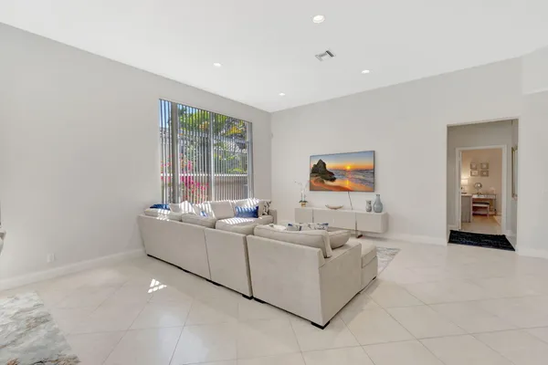 a living room with furniture and window
